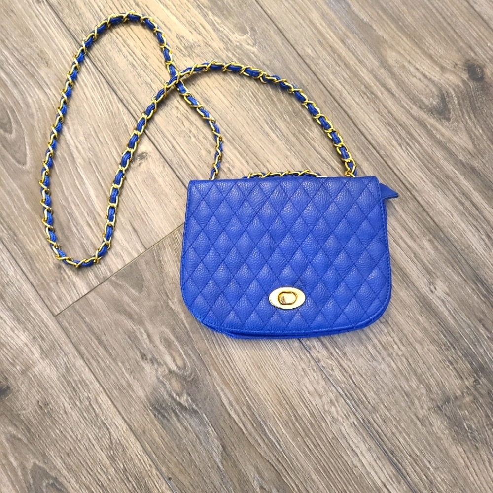 Blue quilted crossbows bag